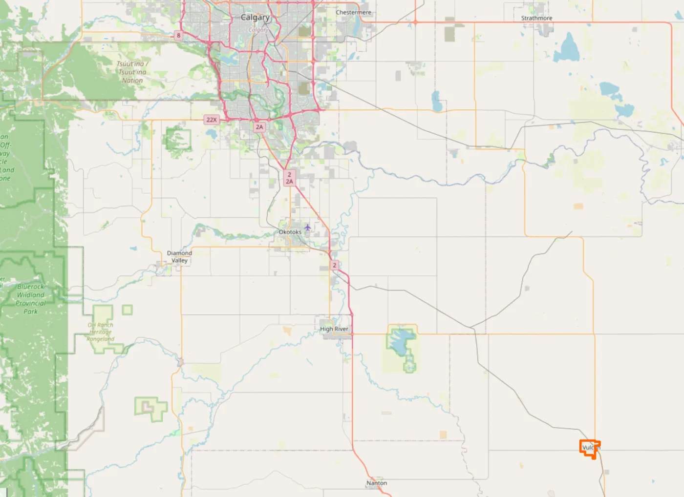A street map of southern Alberta, with Calgary at the top, the towns of Okotoks and High River along Highway 2, and Vulcan outlined in orange at the lower right, south-east of Calgary.